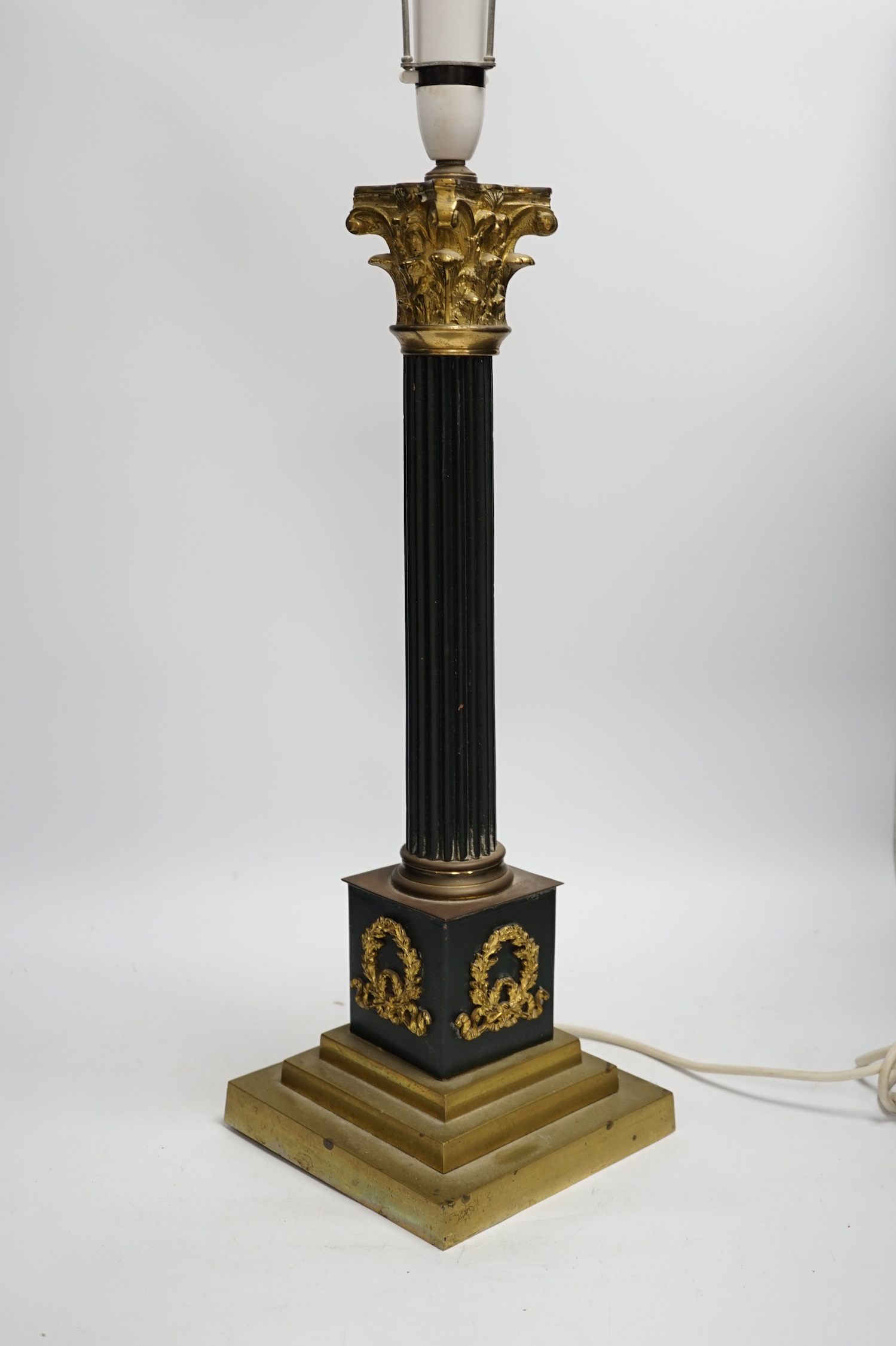 A Corinthian column desk lamp, with laurel wreath panels to base, 56cm